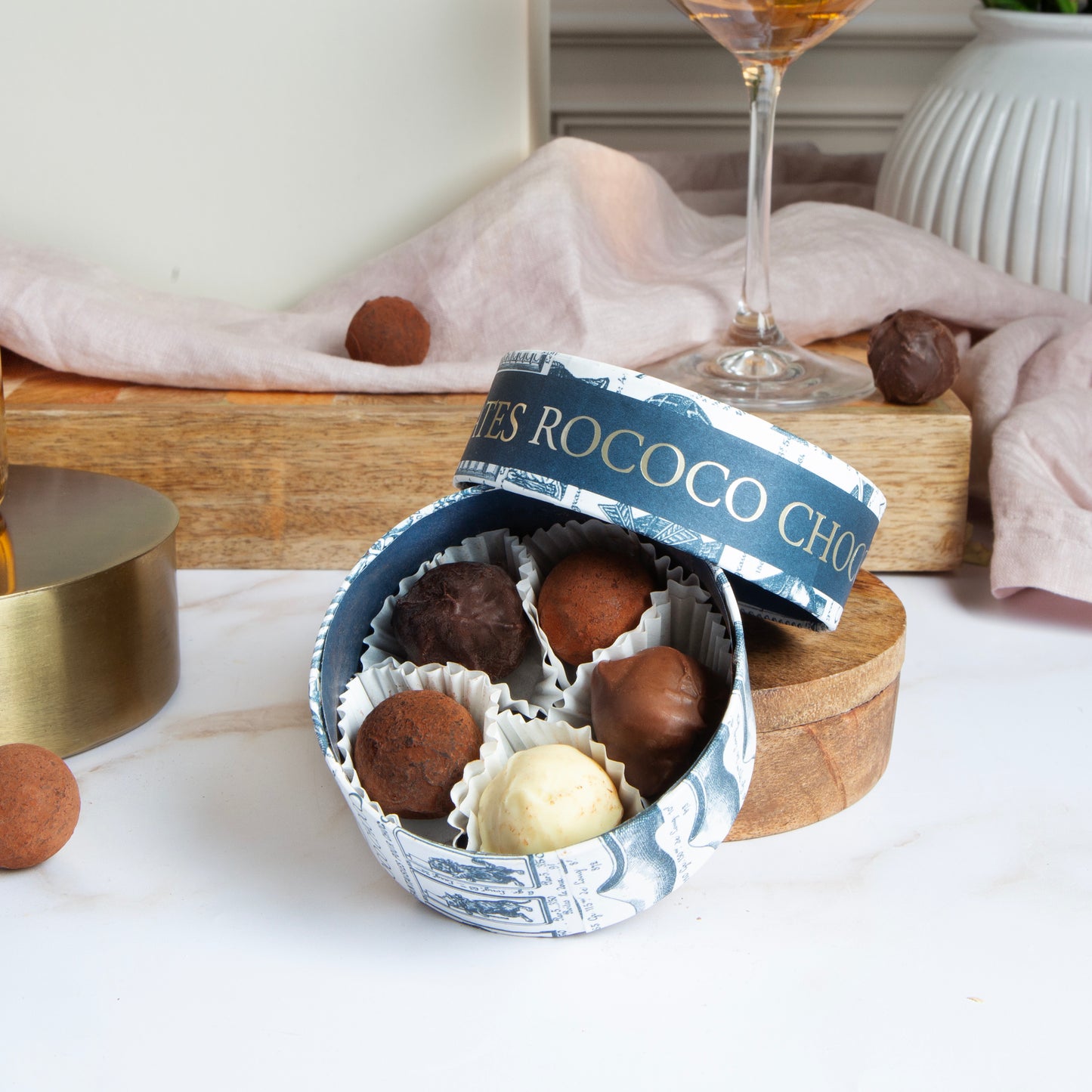 Close up of products Luxury Rosé & Chocolates Gift Box, part of luxury gift hampers from hampers.com UK