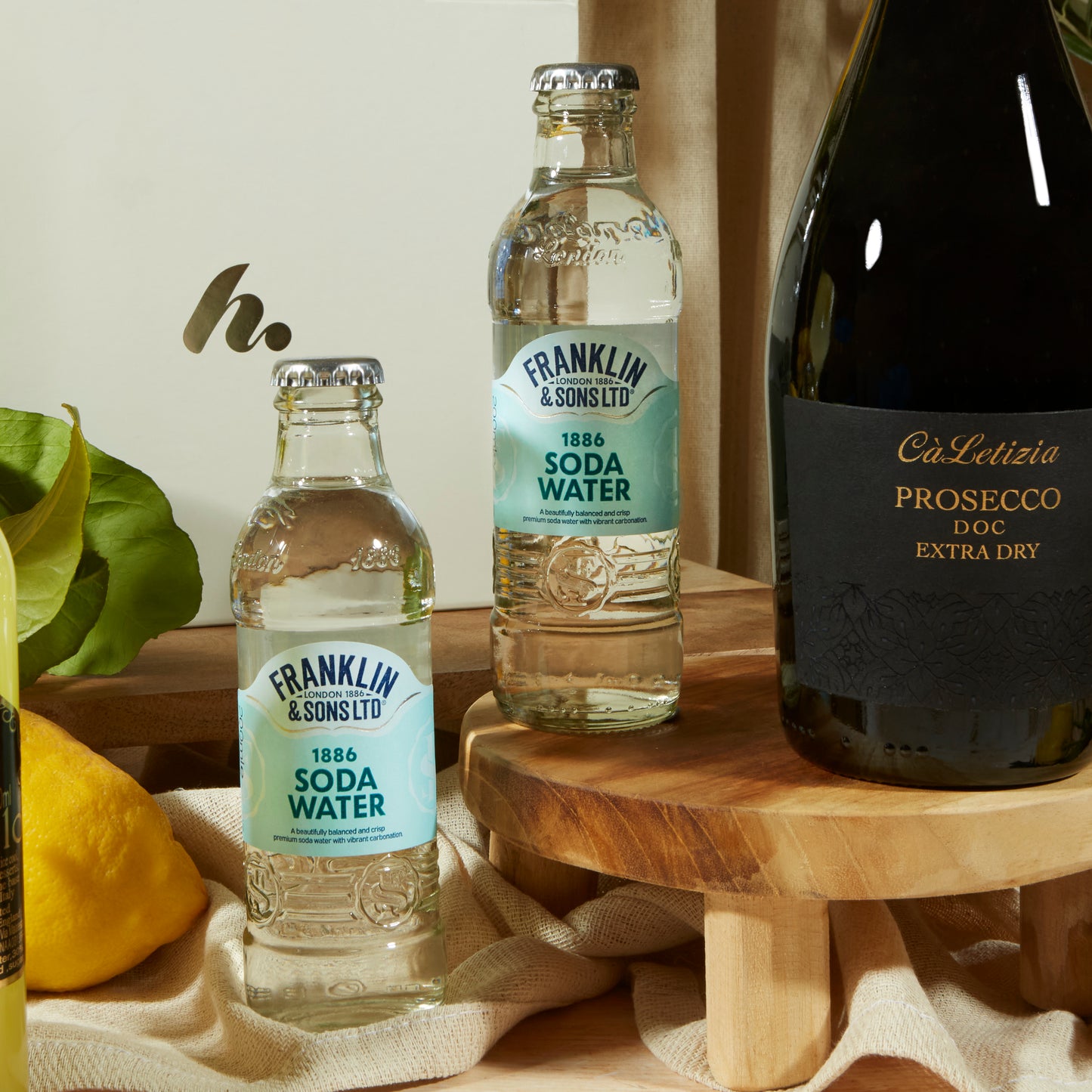 Close up of products in limoncello Spritz Gift Box, a luxury gift hamper from hampers.com UK