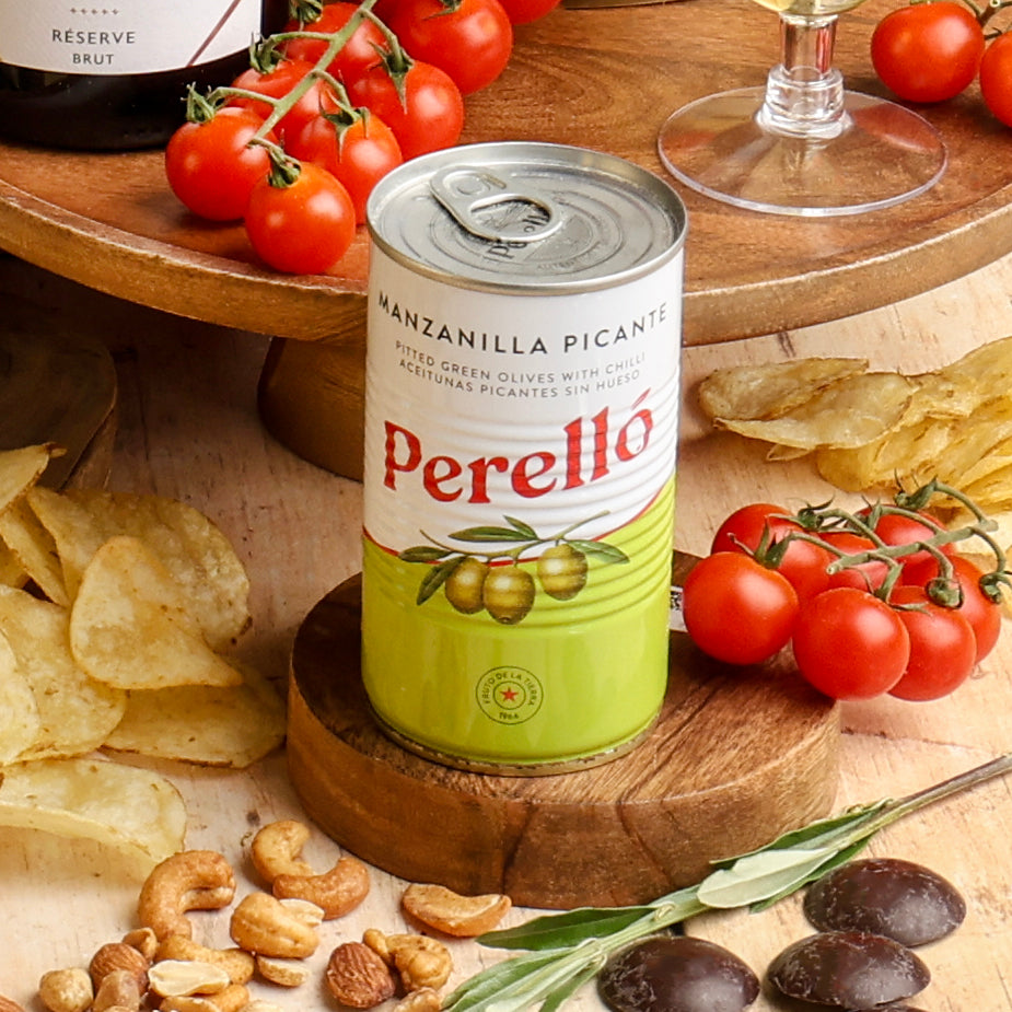 Close up of products in The Perfect Pairing Champagne Picnic Hamper, a luxury gift hamper from hampers.com UK