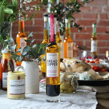 Selection of Charlie & Iv'ys dippers on a table laden with delicious food