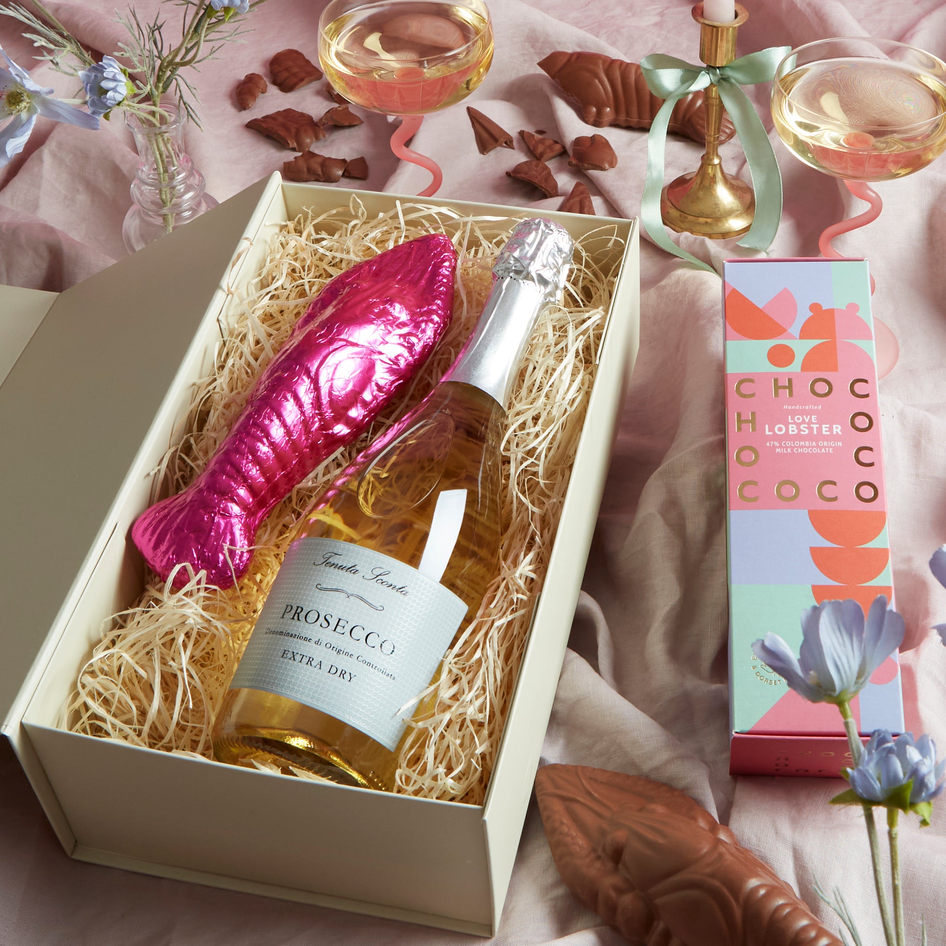 Close up of products in 'You're my Lobster' Prosecco & Chocolates Hamper, a luxury gift hamper from hampers.com UK