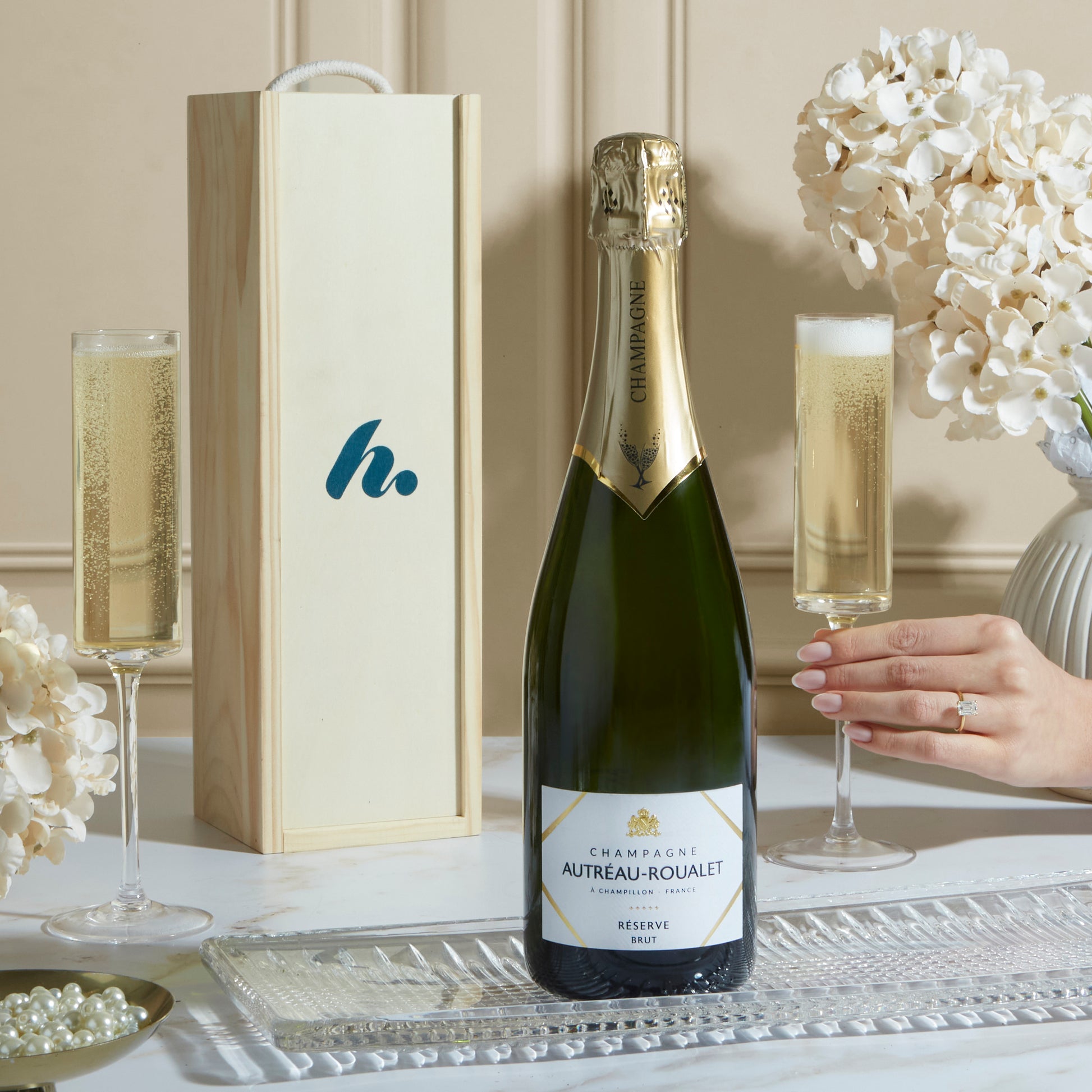 Close up of products in The Luxury Champagne Wooden Gift Box, a luxury gift hamper from hampers.com UK