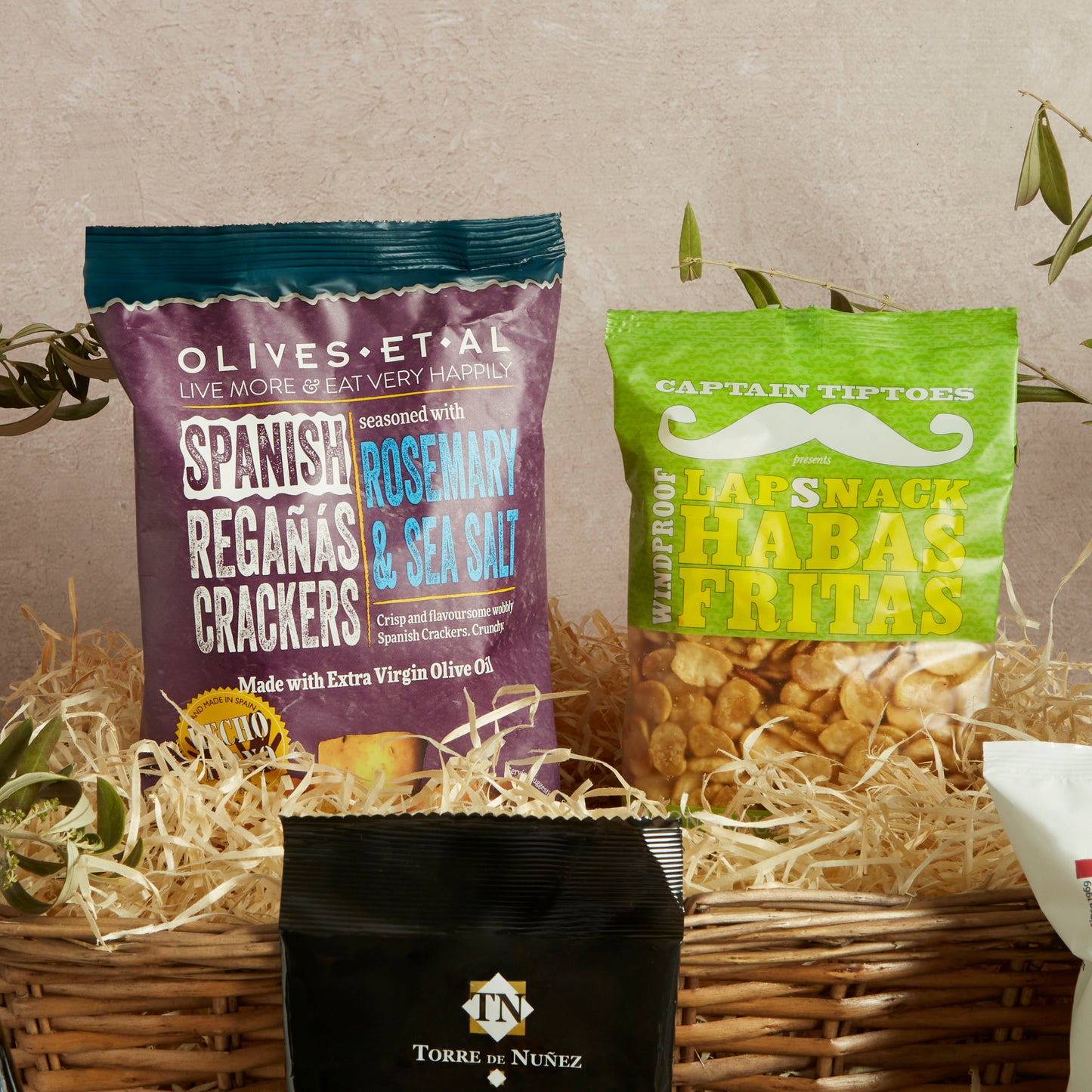 Close up of products in Spanish Tapas Food & Wine Hamper, a luxury gift hamper from hampers.com UK