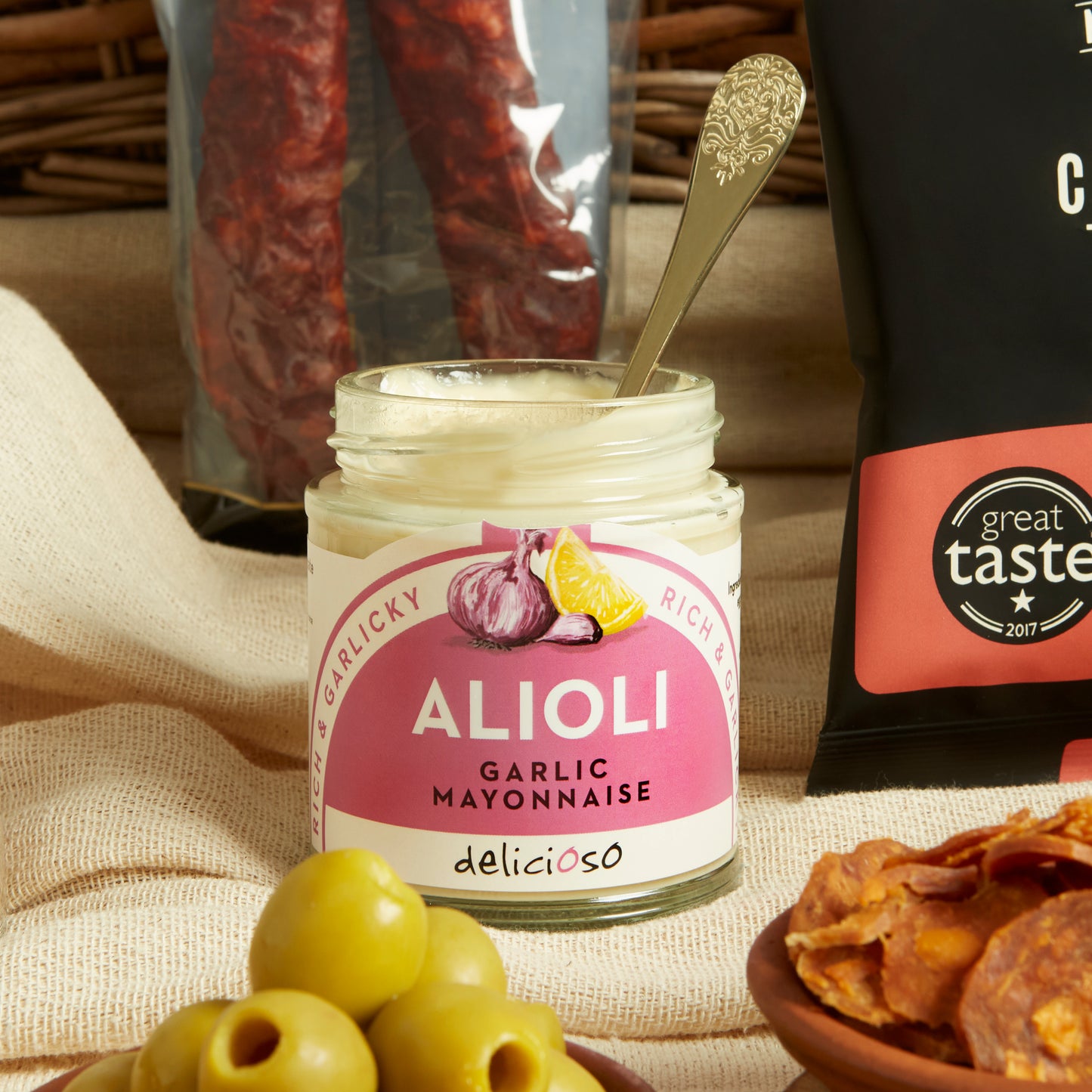 Close up of products in Spanish Tapas Food & Wine Hamper, a luxury gift hamper from hampers.com UK