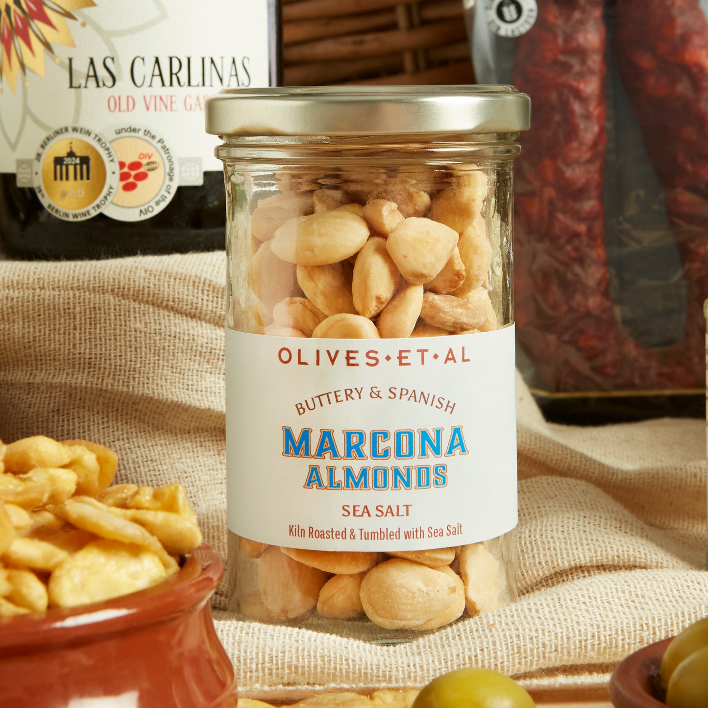 Close up of products in Spanish Tapas Food & Wine Hamper, a luxury gift hamper from hampers.com UK