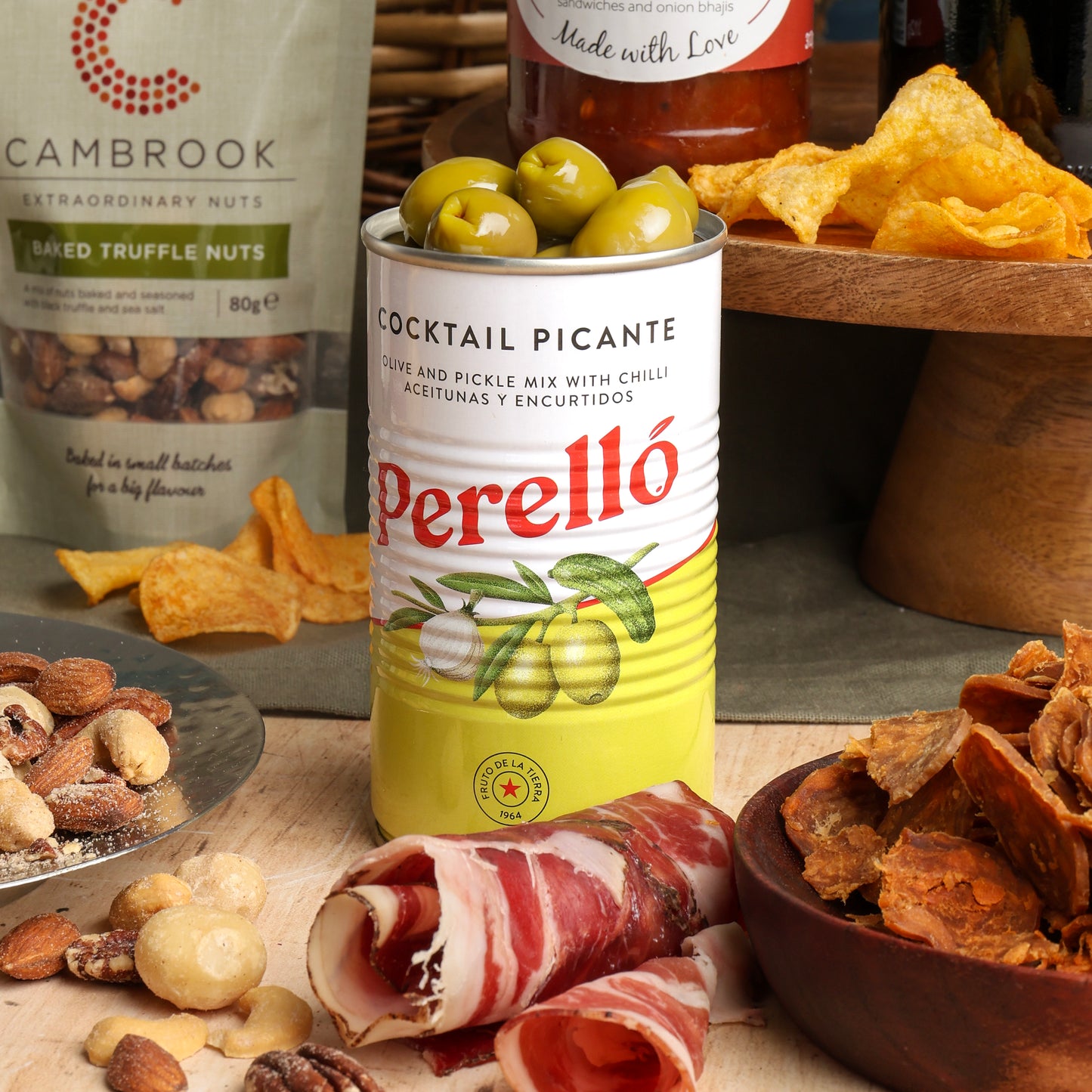 Close up of products in Red Wine & Charcuterie Hamper, a luxury gift hamper from hampers.com UK
