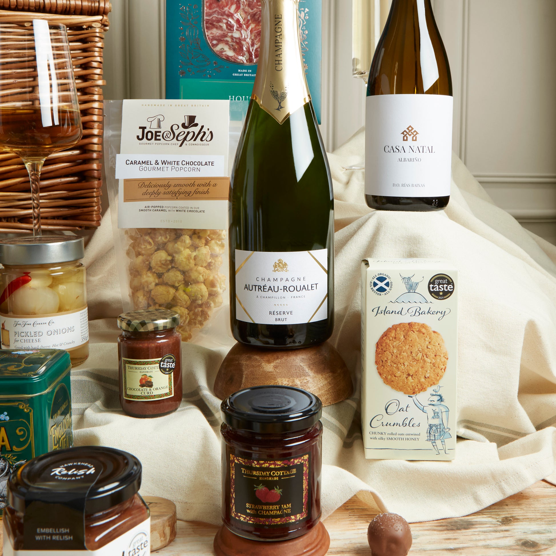 Close up of products in The Deluxe Food & Wine Gift Hamper, a luxury gift hamper from hampers.com