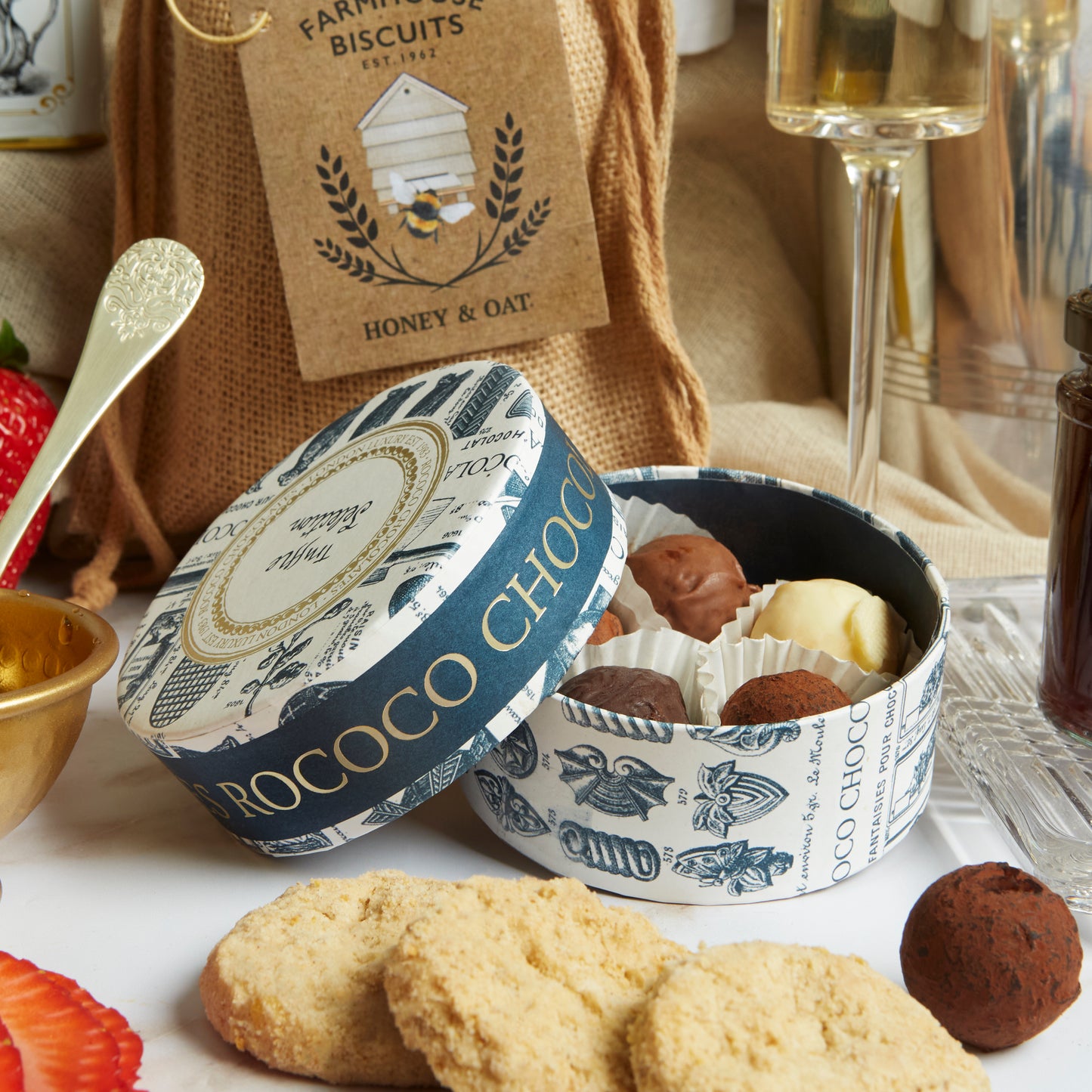 Close up of products in The Champagne Celebration Hamper, a luxury gift hamper from hampers.com UK