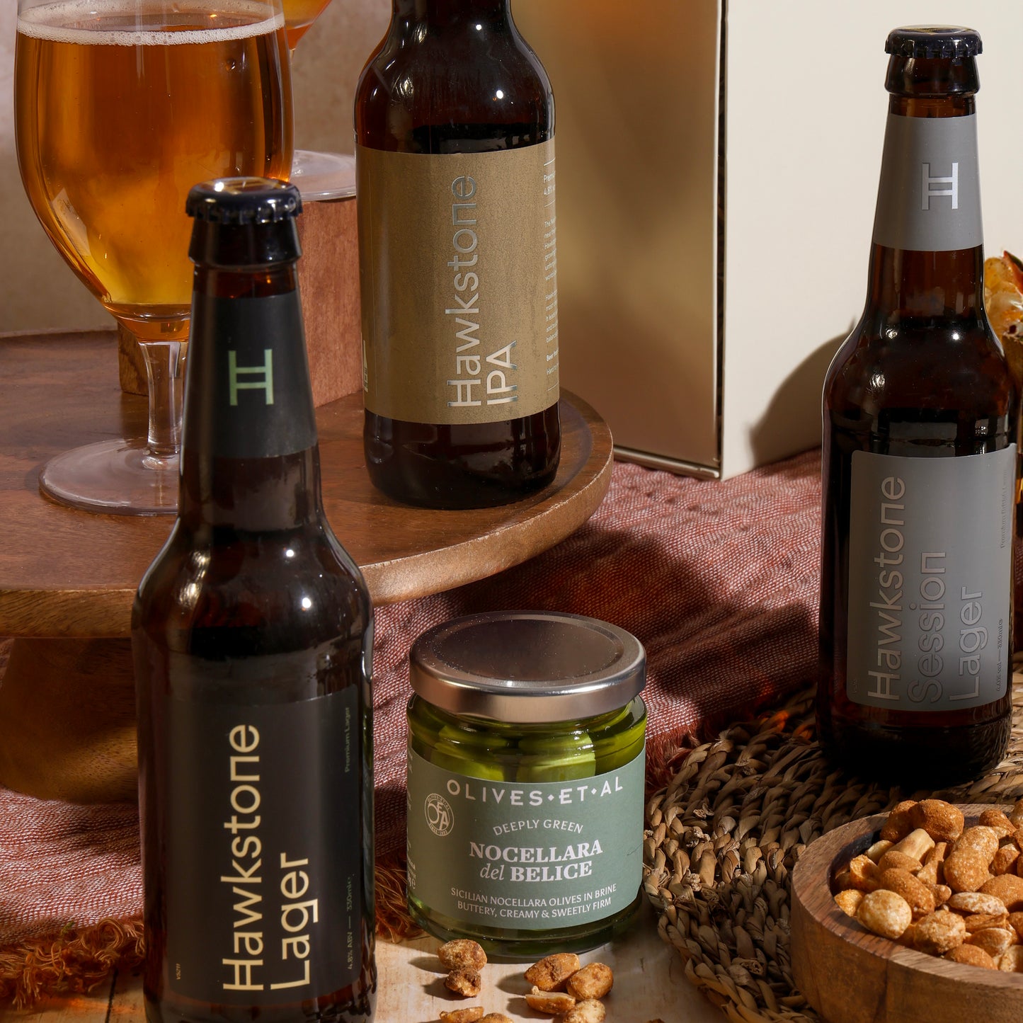Close up of products in Hawkstone Luxury Beer Hamper, a luxury gift hamper from hampers.com UK