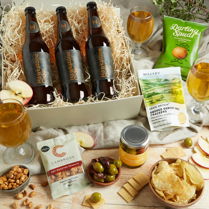 Close up of products in The Hawkstone Cider Hamper, a luxury gift hamper from hampers.com UK