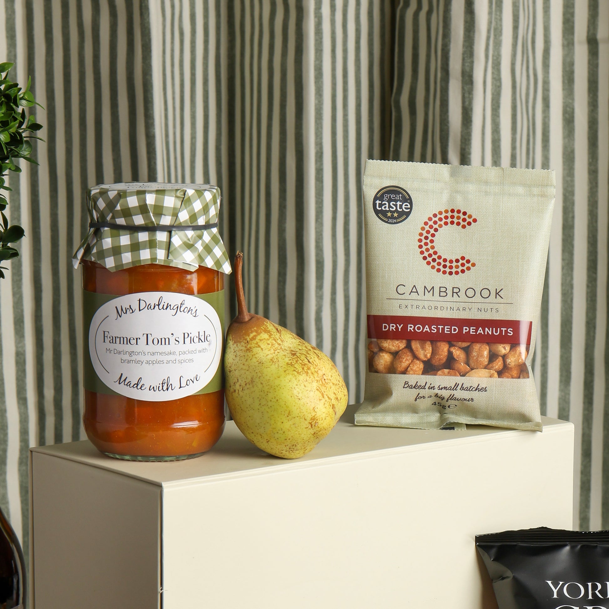 Close up of products in the Hawkstone Cider & Cheese Hamper, a luxury gift hamper from hampers.com UK