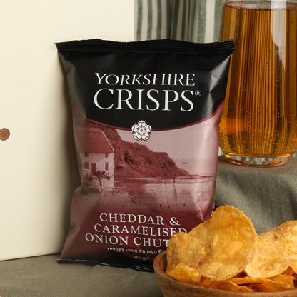 Close up of products in the Hawkstone Cider & Cheese Hamper, a luxury gift hamper from hampers.com UK