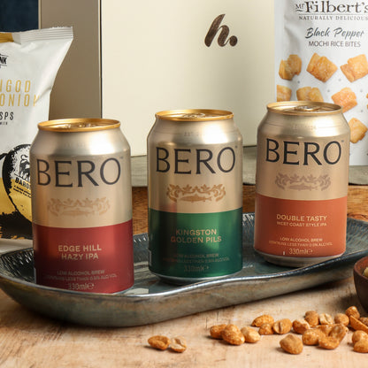 Close up of products in Non Alcoholic Beer & Snacks Hamper, a luxury gift hamper from hampers.com UK