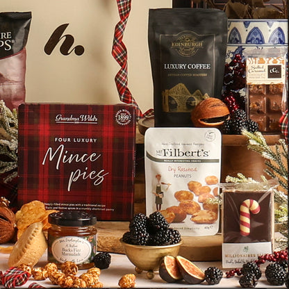 Bearing Gifts Christmas hamper contents, including dry roasted peanuts, mince pies, coffee and marmalade.
