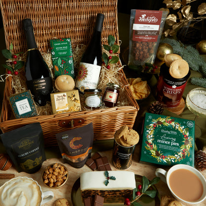 Products from Luxury Bearing Gifts Christmas Hamper presented in a wicker hamper