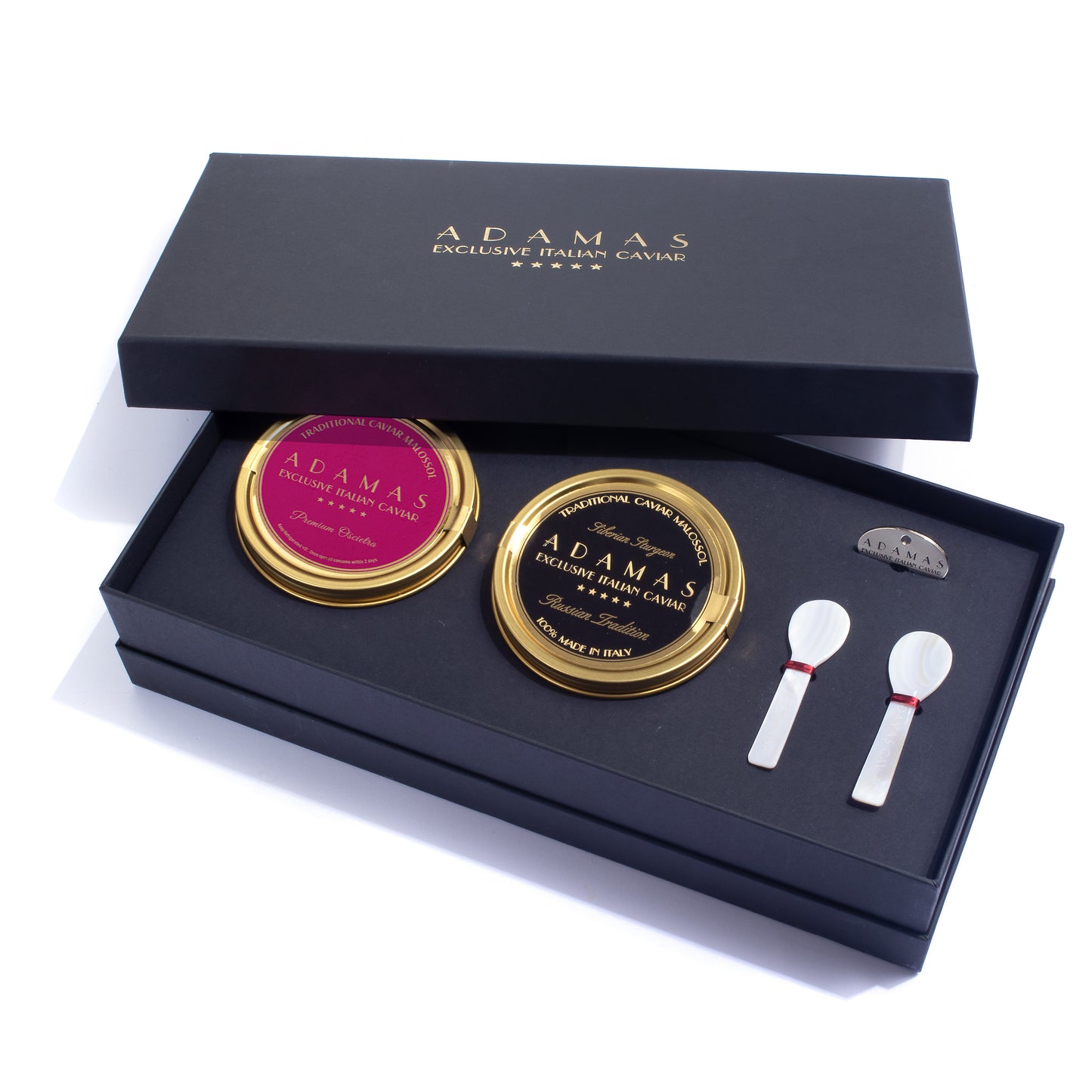 Adamas Luxury Gift Set with pink label and black label caviar, two mother of pearl spoons and a tin opener, presented in a black gift box.