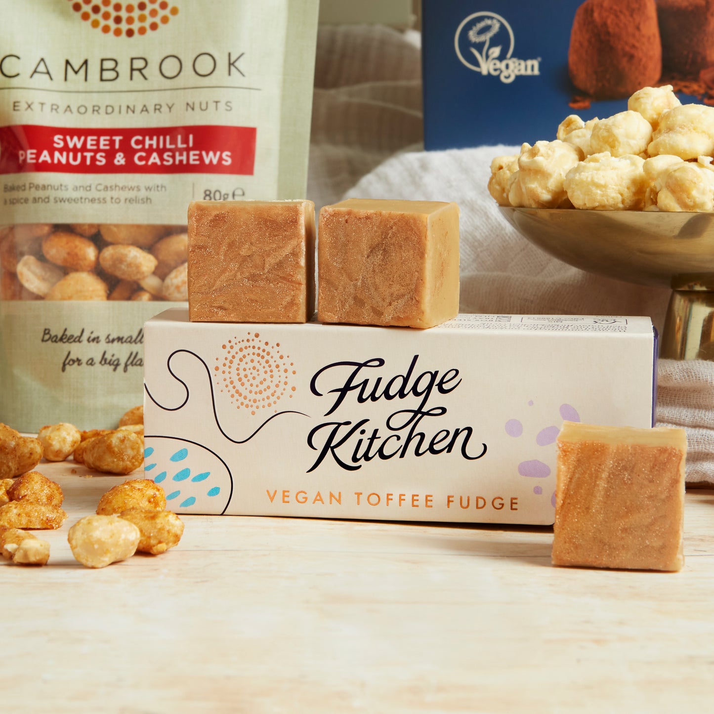 Close up of products in The Vegan Indulgence Hamper, a luxury gift hamper from hampers.com UK