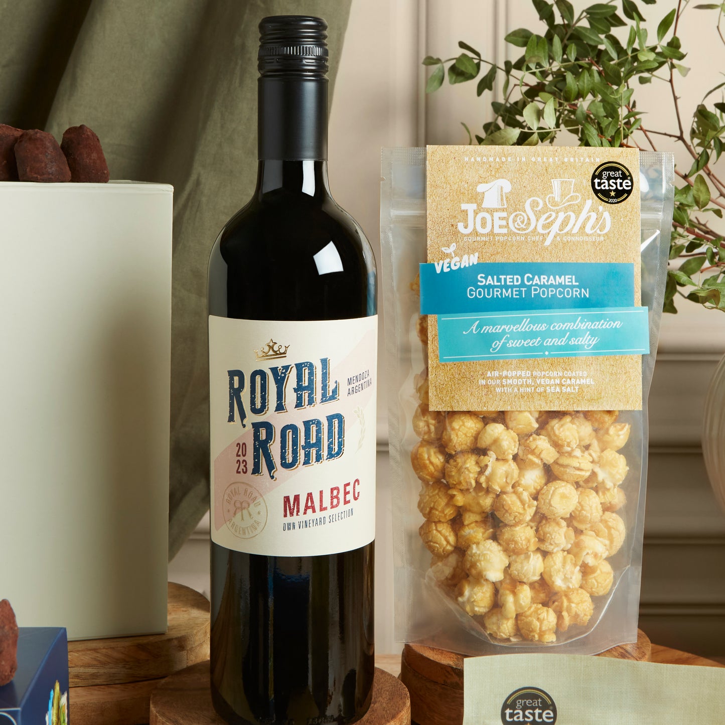 Close up of products in Red Wine & Vegan Treats Hamper, a luxury gift hamper from hampers.com UK