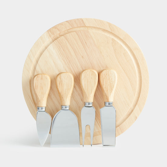 Image of wooden cheeseboard with 4 knives, part of luxury gift hampers from hampers.com UK