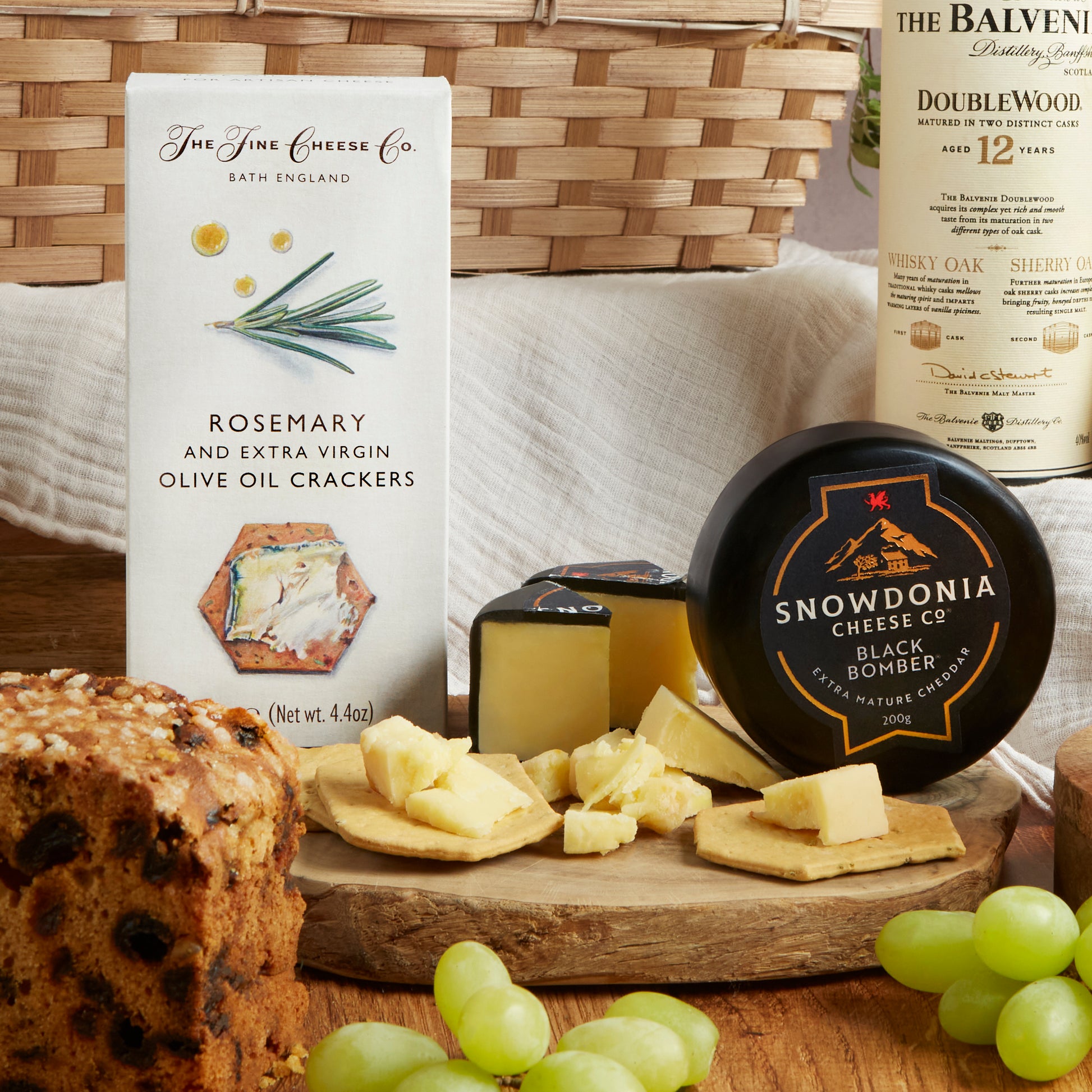 Close up of products in the Premium Whisky & Food Gift Basket, a luxury gift hamper from hampers.com UK