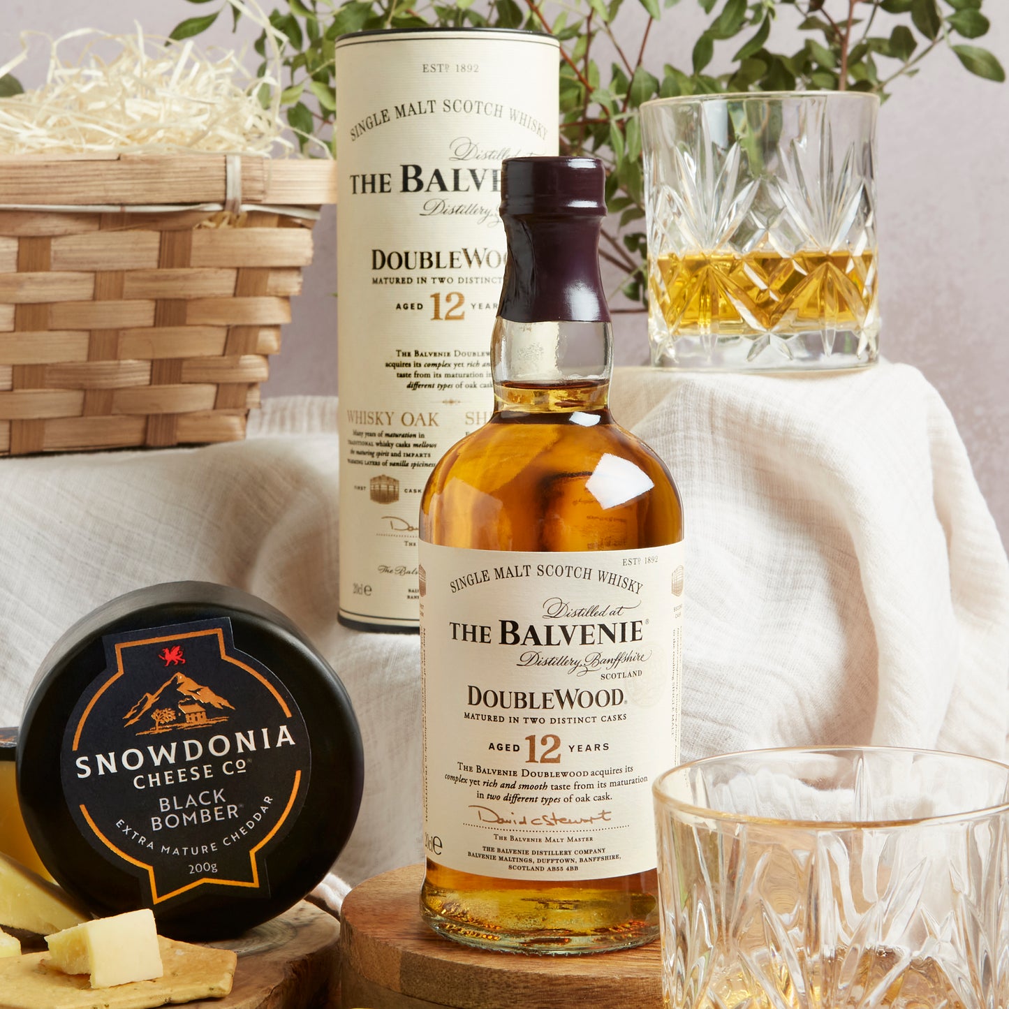 Close up of products in the Premium Whisky & Food Gift Basket, a luxury gift hamper from hampers.com UK
