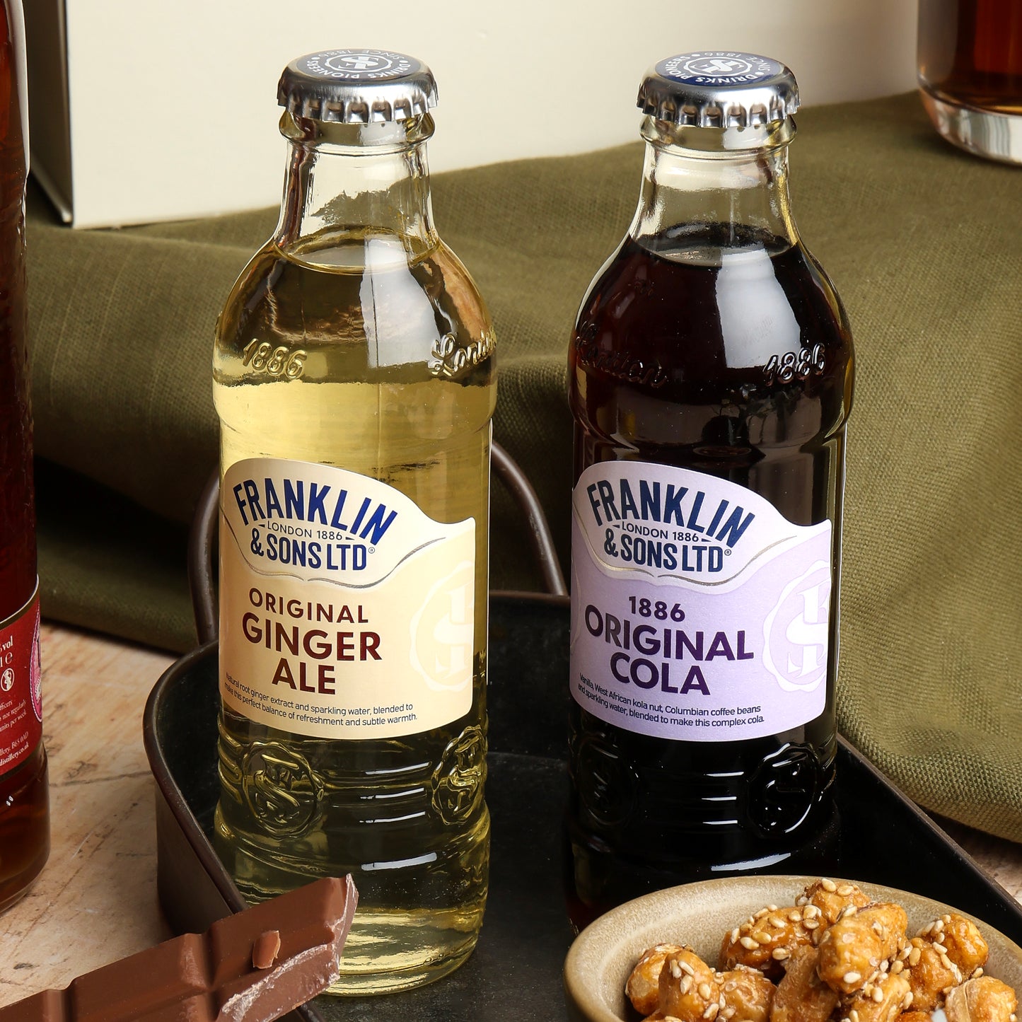 Close up of products in Spiced Rum & Chocolate Hamper, a luxury gift hamper from hampers.com UK