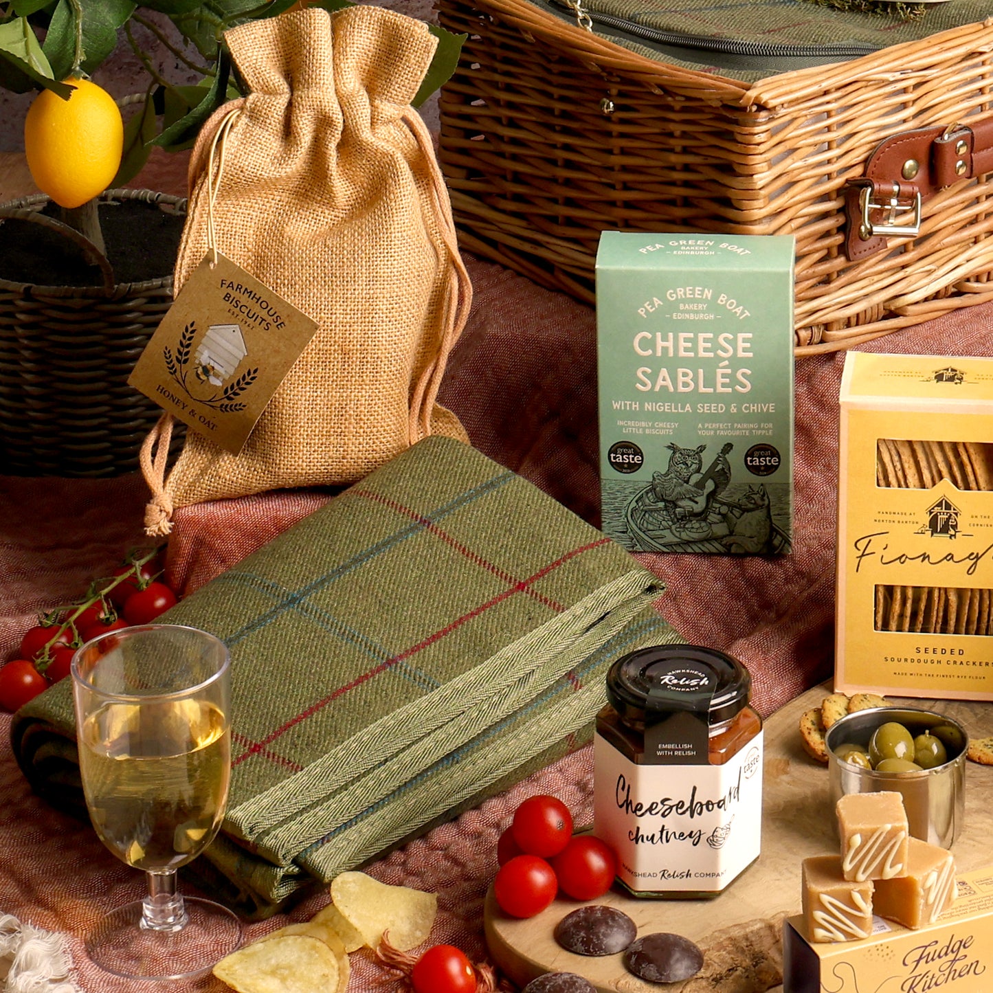 Close up of products in The Perfect Pairing Champagne Picnic Hamper, a luxury gift hamper from hampers.com UK