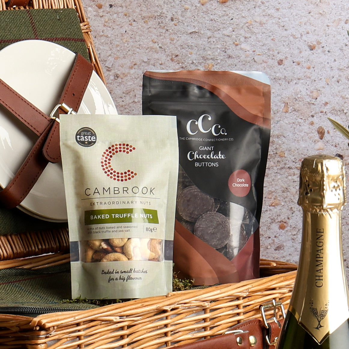 Close up of products in The Perfect Pairing Champagne Picnic Hamper, a luxury gift hamper from hampers.com UK