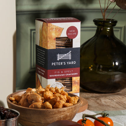 Close up of products in Cheese and Nibbles Gift, a luxury gift hamper from hampers.com UK