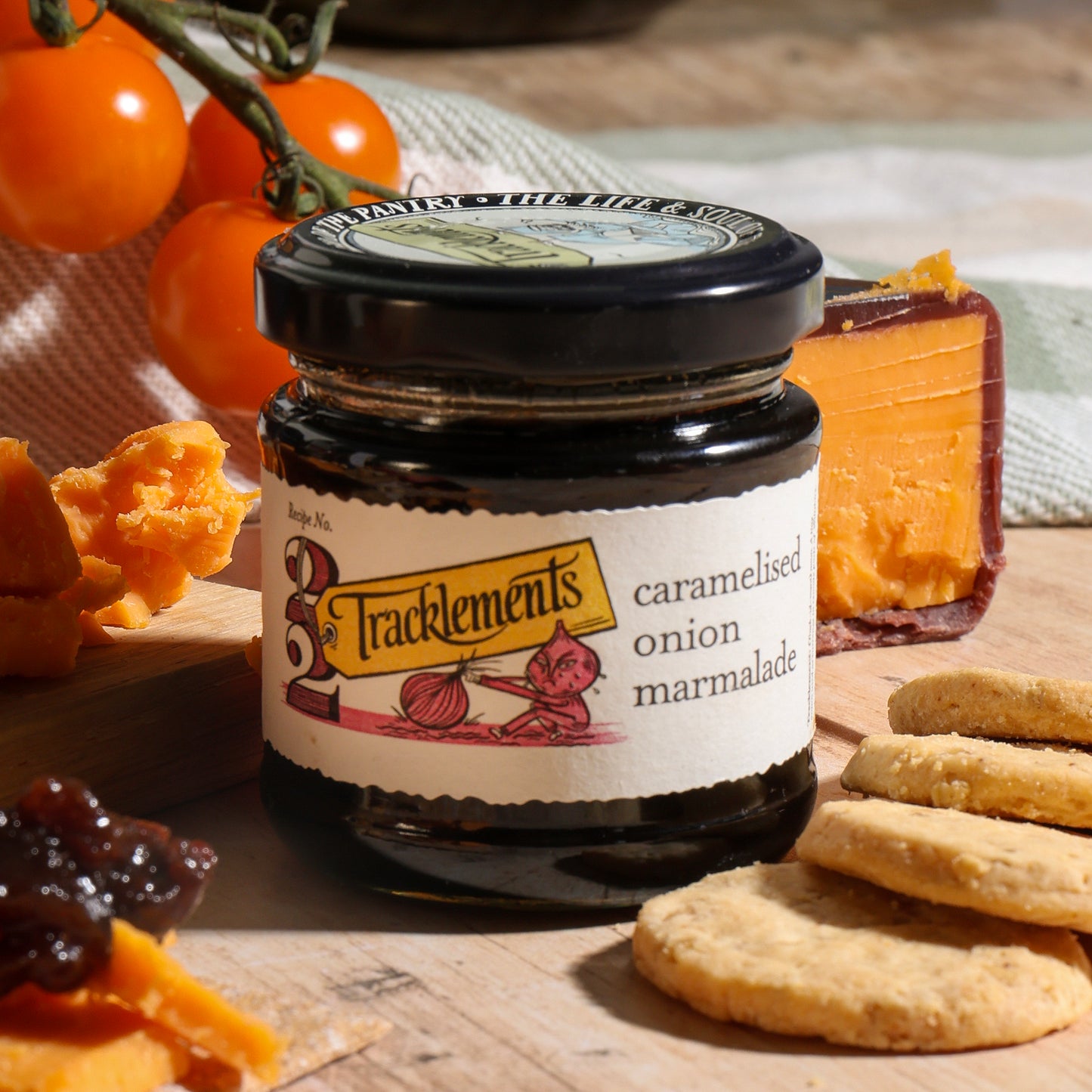 Close up of products in Cheese and Nibbles Gift, a luxury gift hamper from hampers.com UK