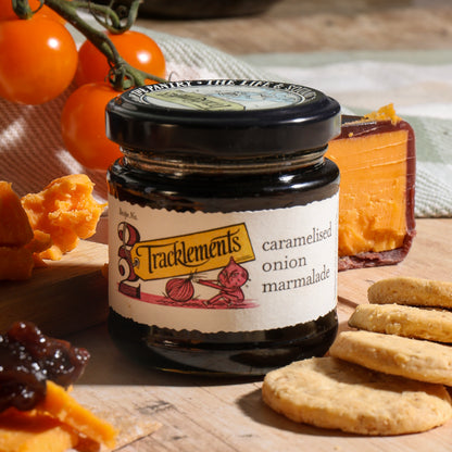 Close up of products in Cheese and Nibbles Gift, a luxury gift hamper from hampers.com UK