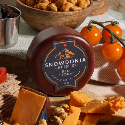 Close up of products in Cheese and Nibbles Gift, a luxury gift hamper from hampers.com UK