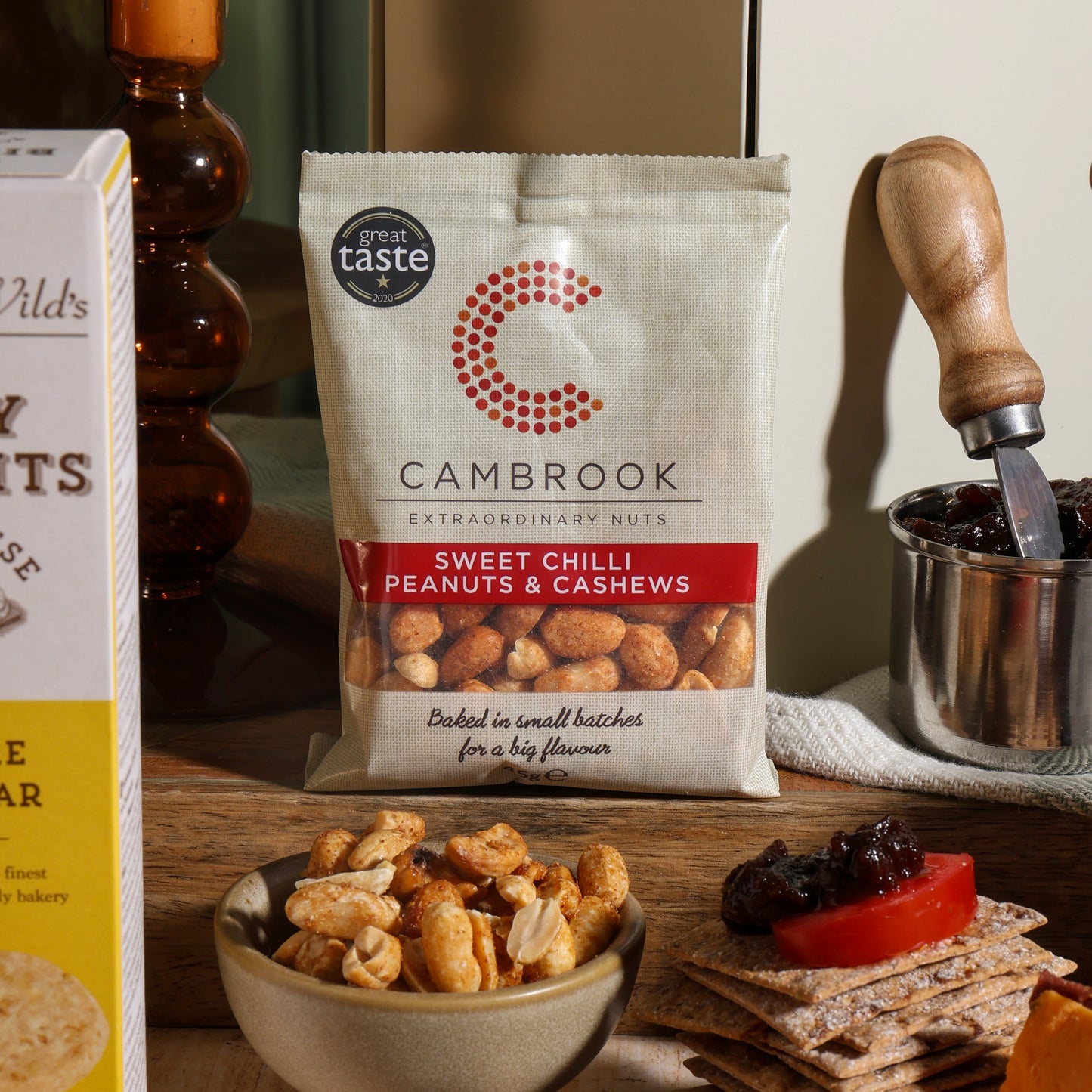 Close up of products in Cheese and Nibbles Gift, a luxury gift hamper from hampers.com UK