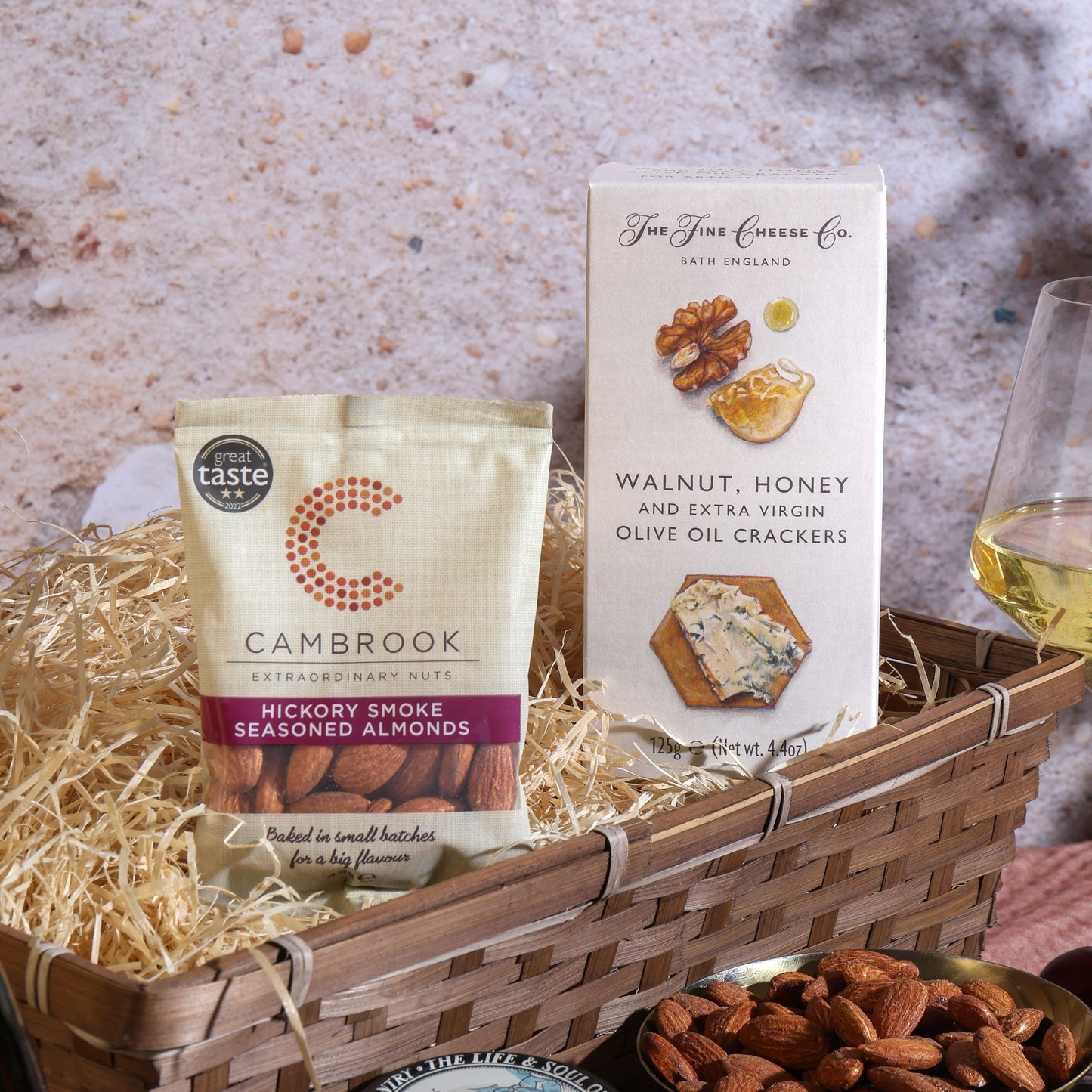 Close up of products in Luxury White Wine, Cheese & Quince Hamper, a luxury gift hamper from hampers.com UK
