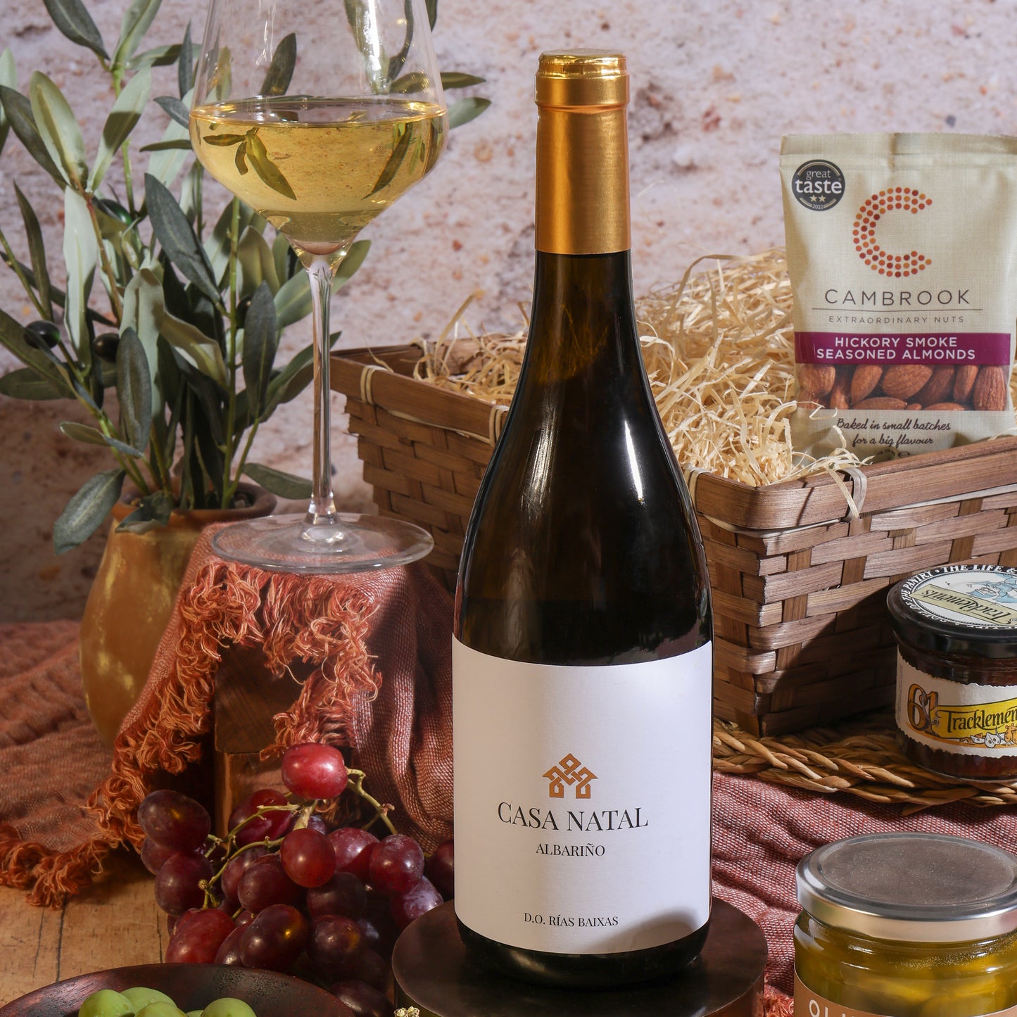 Close up of products in Luxury White Wine, Cheese & Quince Hamper, a luxury gift hamper from hampers.com UK