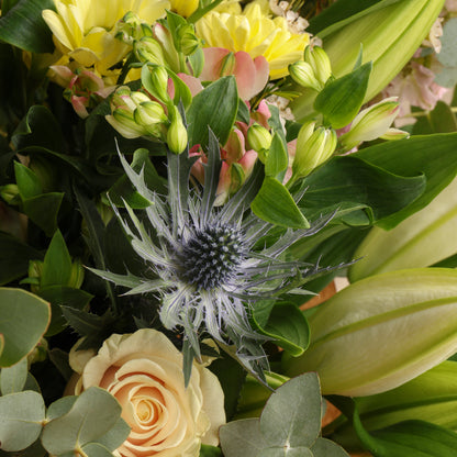 A close-up floral arrangement displaying the large seasonal flower bouquet.