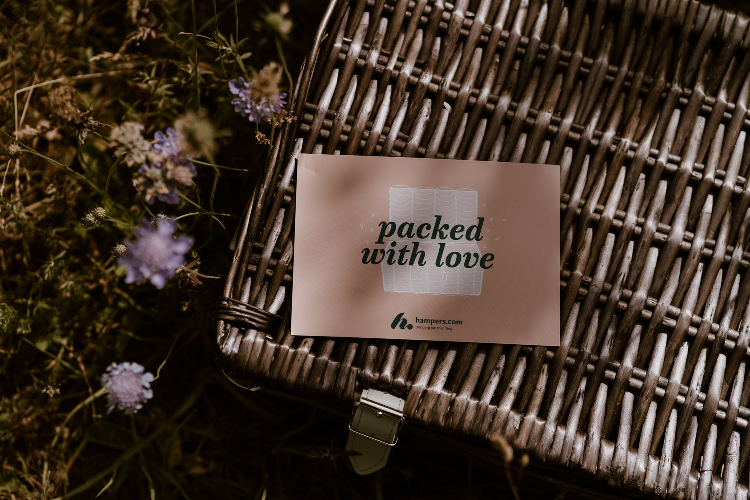 Luxury picnic hamper filled with artisan food and wine