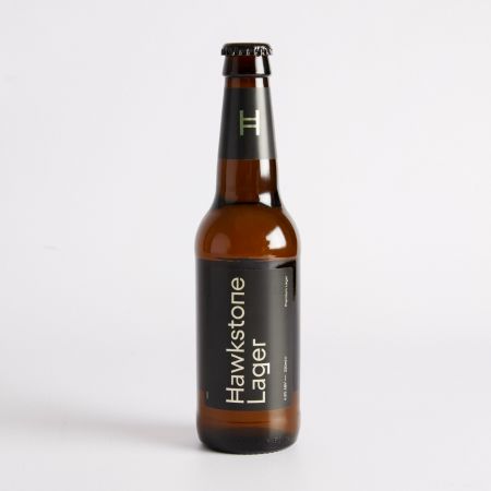 Image of 330ml Premium Lager by Hawkstone, part of luxury gift hampers from hampers.com UK
