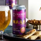 Close up of products in The Curry Night Indian Beer Hamper, a luxury gift hamper from hampers.com UK