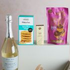 Close up of products in Sweet & Savoury Delights With Prosecco, a luxury gift hamper at hampers.com