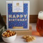 Close up of products in Happy Birthday Beer Hamper, a luxury gift hamper at hampers.com