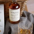 Close up of products in Premium Whisky & Food Gift Basket, a luxury gift hamper at hampers.com