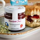 Close up of products in Cream Tea Hamper With Prosecco For One, a luxury gift hamper at hampers.com