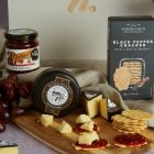 Close up of products in Gourmet Cheese & Wine Gift, a luxury gift hamper at hampers.com