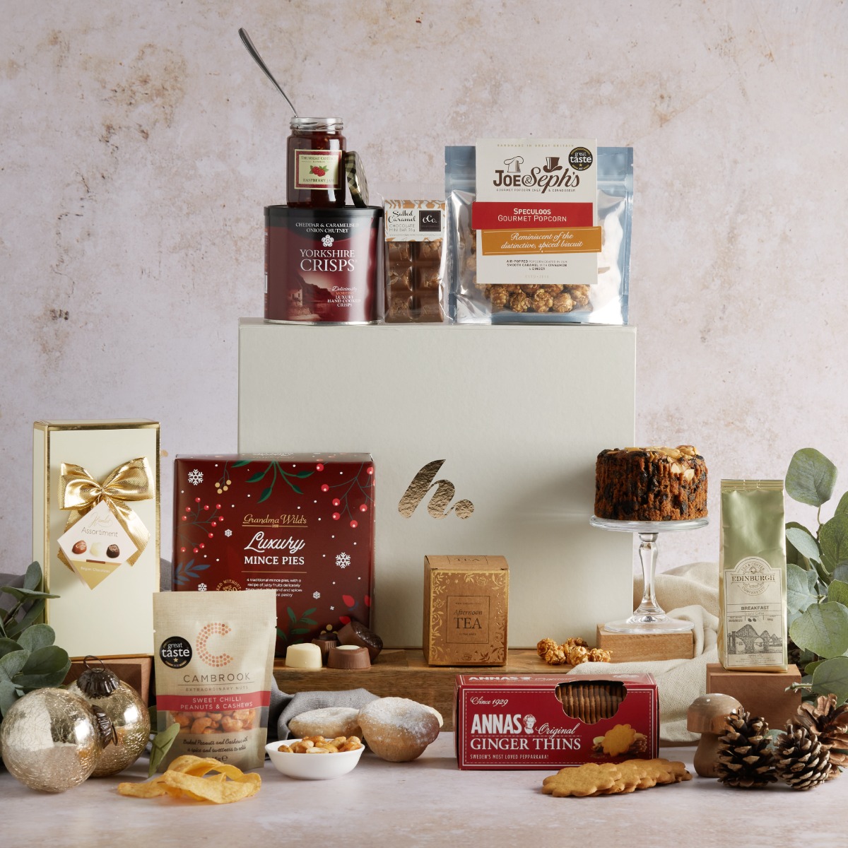 The Bearing Gifts Christmas hamper with contents on display