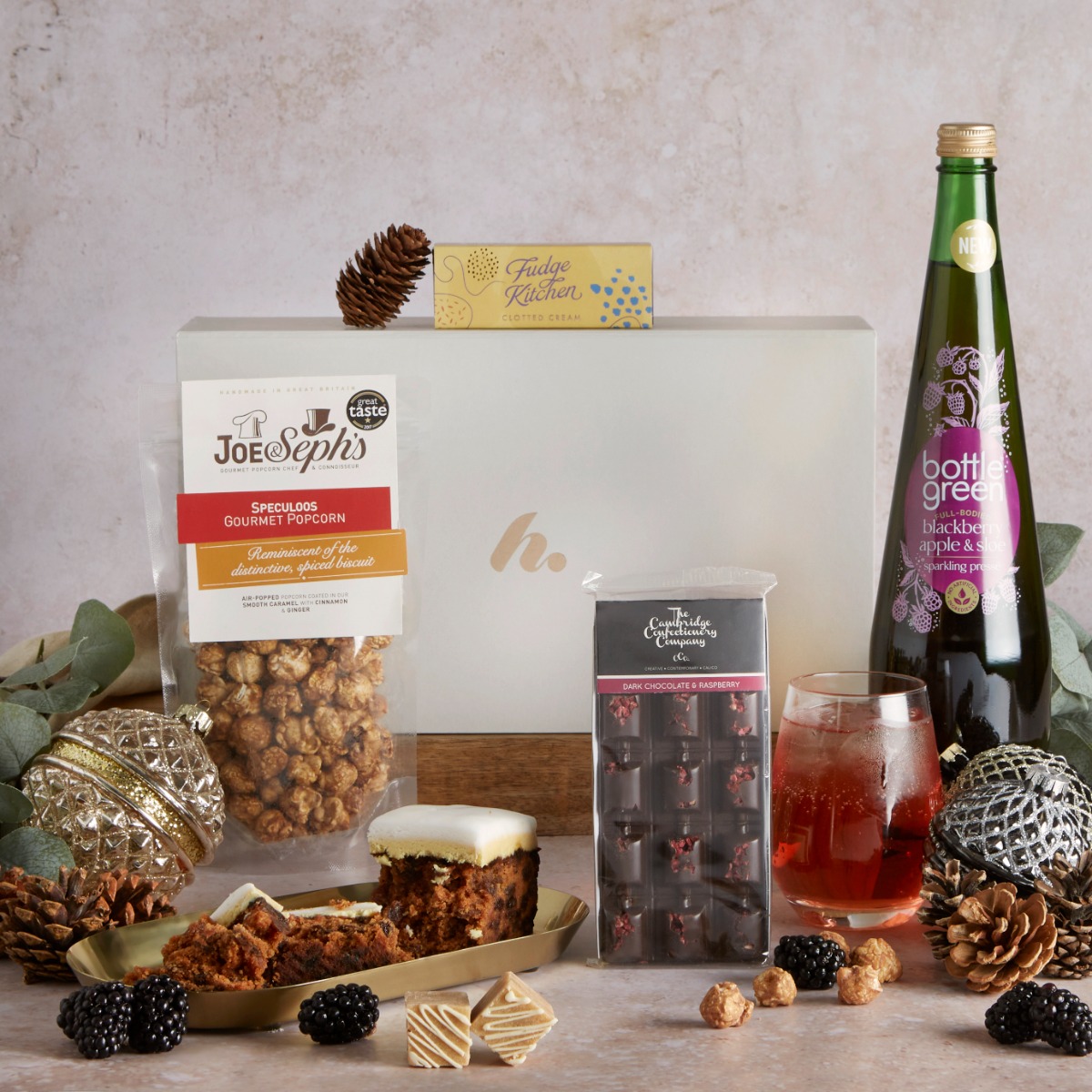 The Festive Flavours Hamper with Christmas contents on display (all of which are gluten free)