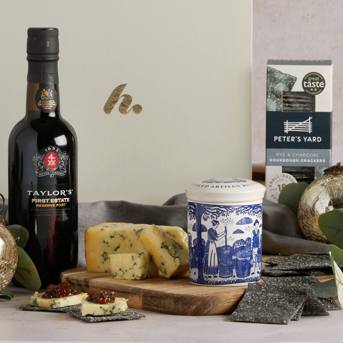 The Little Port & Stilton Christmas Gift Box with contents on display