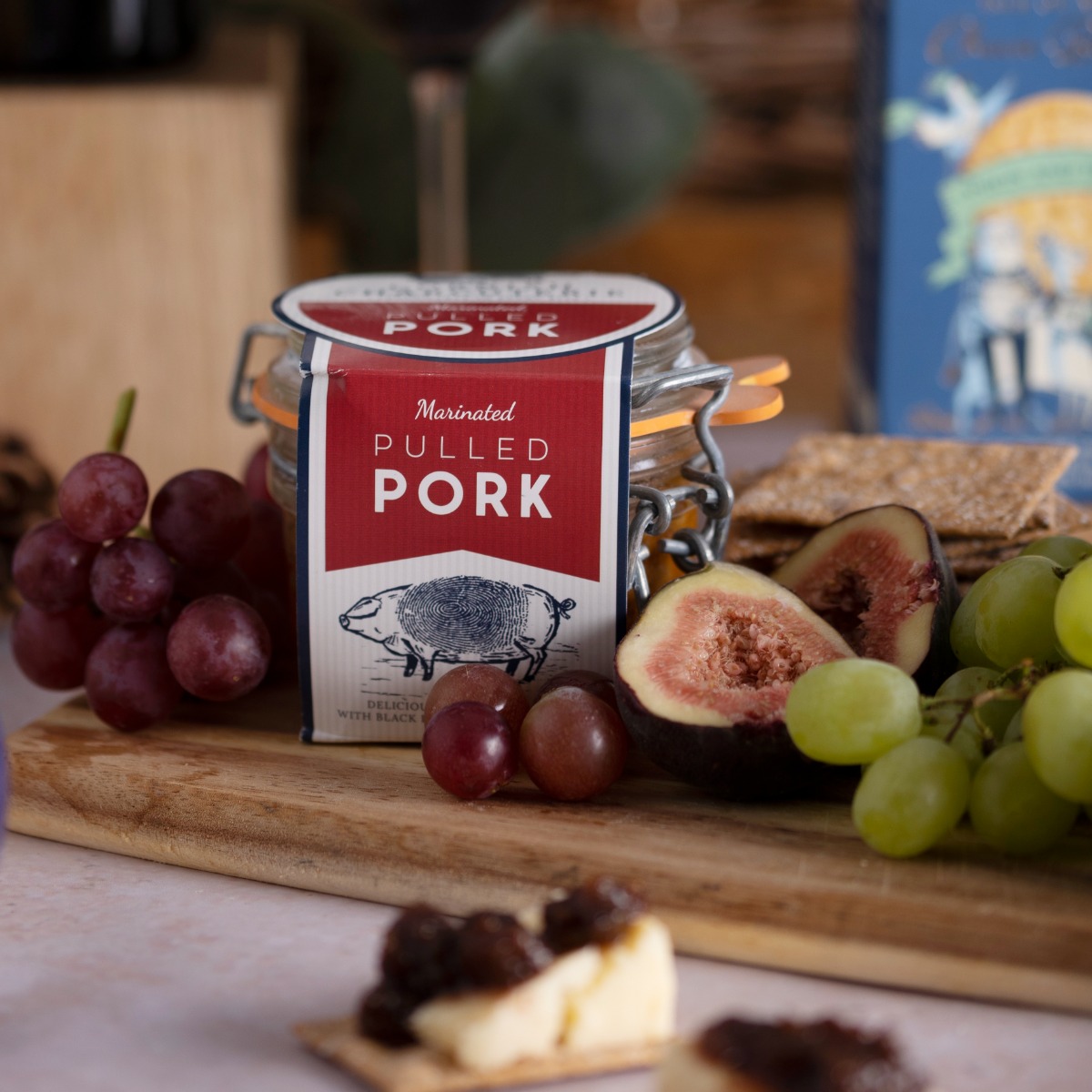 A jar of pork rillette from the Cornish Charcuterie on a wooden board