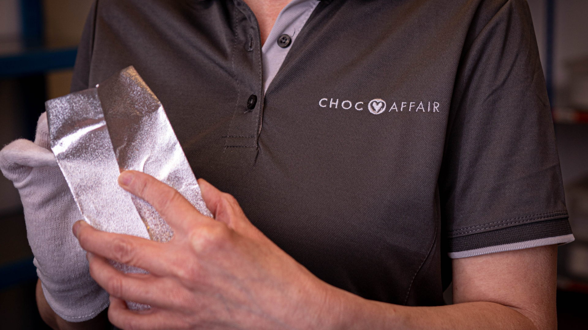Close up of Choc Affair uniform and silver bag