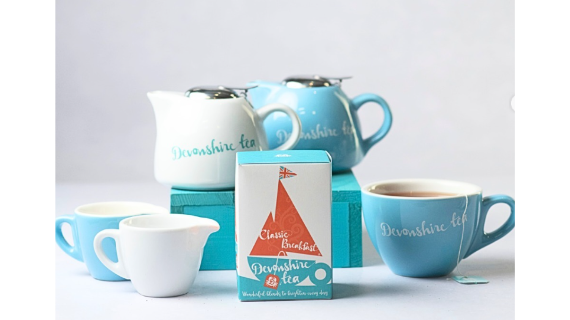 Box of Devonshire Tea with branded tea pot and tea cups 